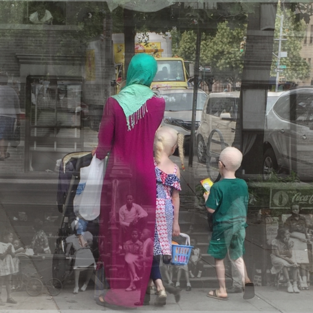 Family on Lenox Avenue Mother in a green headscarf with her
three children, one in a printed dress, walking on a city street with a blurred background.